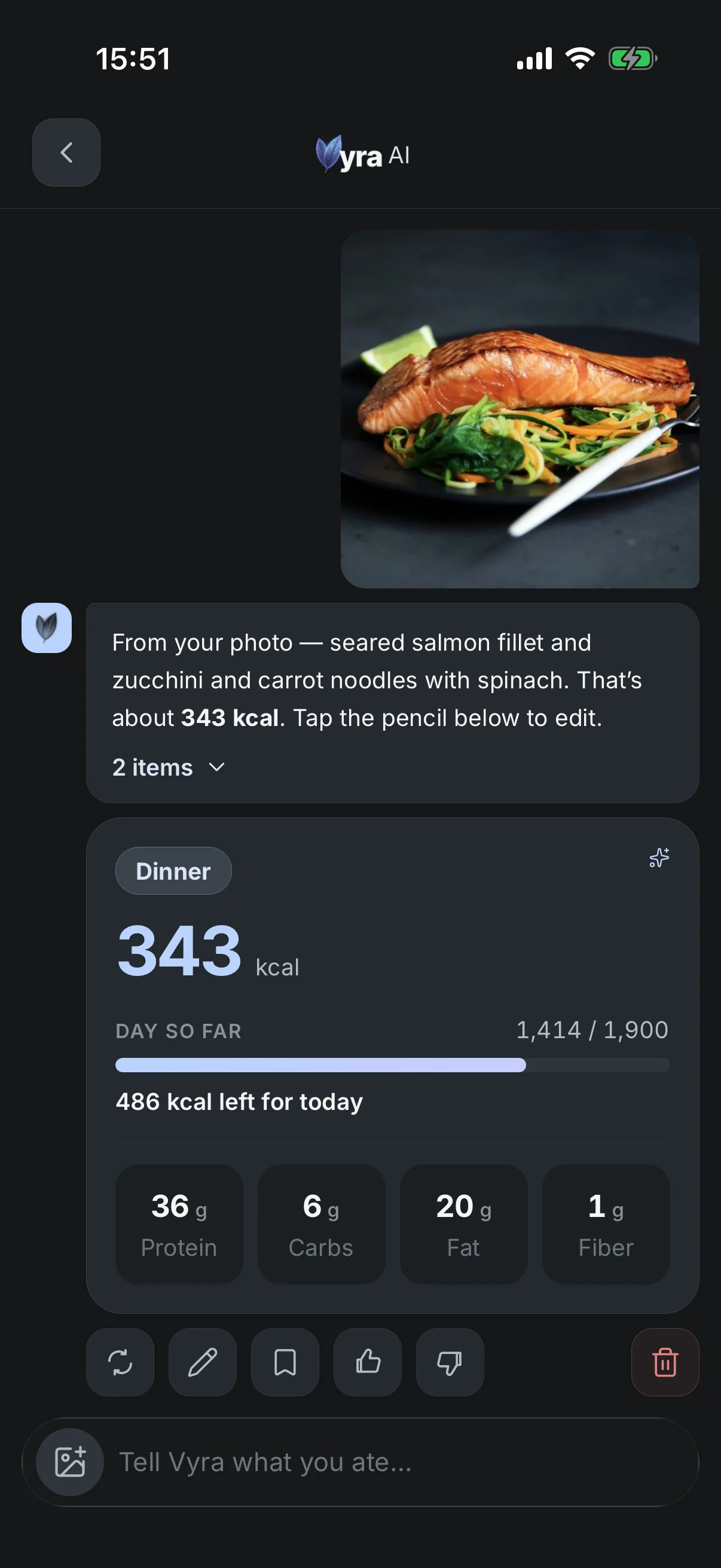 A Vyra AI meal: a photo of a salmon fillet on a dark plate, over zucchini and carrot noodles with spinach and a lime wedge; and Vyra&rsquo;s reply naming a salmon fillet and the zucchini and carrot noodles with spinach as two items, putting the meal at about 343 kcal, with a dinner card beneath it reading 36 g protein, 6 g carbs, 20 g fat and 1 g fiber.